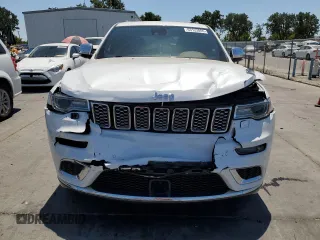 2018 Jeep Grand Cherokee Summit with VIN 1C4RJEJG9JC212554, listed as a Copart auction lot 63123065 with 82,976 mi miles and Salvage title. Bid and sale history available at DreamBid. Image 5.