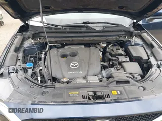 2021 Mazda CX-5 Grand Touring with VIN JM3KFADM0M1321375, listed as a IAAI auction lot 41913449 with 88,178 mi miles. Bid and sale history available at carsss.com. Image 10.