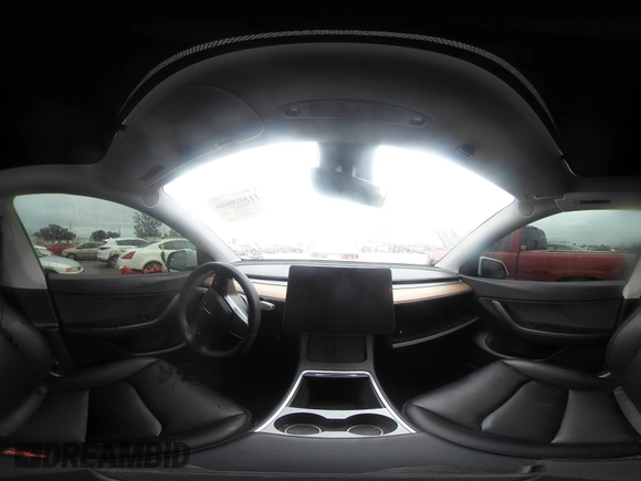 2021 Tesla Model Y Long Range with VIN 5YJYGAEE2MF260142, listed as a IAAI auction lot 41808666 with 87,316 mi miles and . Bid and sale history available at DreamBid. Image 17.