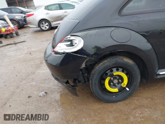2013 Volkswagen Beetle 2.5L w/Sun/Sound/Nav with VIN 3VWJX7AT1DM686146, listed as a IAAI auction lot 41444277 with 92,964 mi miles and . Bid and sale history available at DreamBid. Image 6.