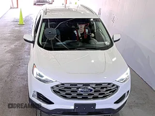 2019 Ford Edge SEL with VIN 2FMPK3J9XKBC37759, listed as a IAAI auction lot 42666643 with 103,812 mi miles and . Bid and sale history available at DreamBid. Image 3.