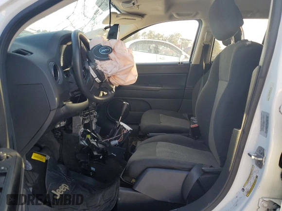 2016 Jeep Compass Sport with VIN 1C4NJDBB4GD713947, listed as a Copart auction lot 79004994 with 0 mi miles and Salvage Title. Bid and sale history available at carsss.com. Image 7.