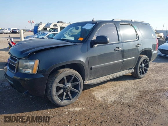 2007 Chevrolet Tahoe LS with VIN 1GNFC13CX7R406202, listed as a IAAI auction lot 41951878 with 181,571 mi miles and . Bid and sale history available at DreamBid. Image 2.