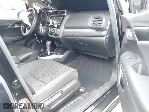 2017 Honda Fit LX with VIN JHMGK5H51HS012176, listed as a IAAI auction lot 42011477 with 91,894 mi miles. Bid and sale history available at carsss.com. Image 5.