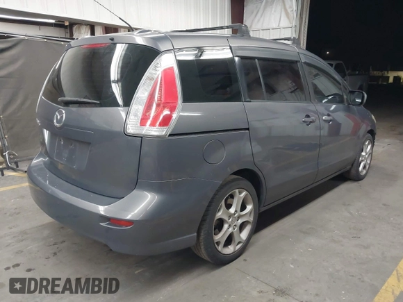 2010 Mazda 5 Sport with VIN JM1CR2WL8A0361879, listed as a IAAI auction lot 42174918 with 179,058 mi miles and . Bid and sale history available at DreamBid. Image 4.