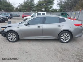 2016 Kia Optima EX with VIN 5XXGU4L33GG108511, listed as a IAAI auction lot 41355565 with 167,111 mi miles. Bid and sale history available at carsss.com. Image 14.