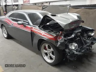 2012 Dodge Challenger R/T z VIN 2C3CDYBT1CH149903, wystawiony jako IAAI lot #42031543 z przebiegiem 198 017 mil mil oraz . Historia ofert i sprzedaży dostępna na DreamBid. Obrazek 1.