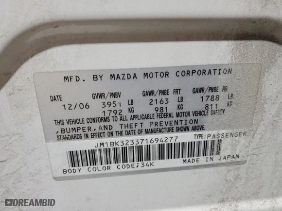 2007 Mazda Mazda3 s Touring with VIN JM1BK323371694277, listed as a Copart auction lot 53967735 with 296,776 mi miles and Salvage Title. Bid and sale history available at carsss.com. Image 12.