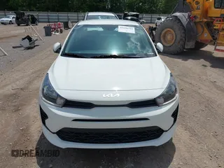2023 Kia Rio S z VIN 3KPA24ADXPE613557, wystawiony jako IAAI lot #42198794 z przebiegiem 25 275 mil mil oraz . Historia ofert i sprzedaży dostępna na DreamBid. Obrazek 12.