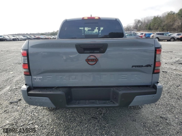 2024 Nissan Frontier PRO-4X with VIN 1N6ED1EK8RN659581, listed as a Copart auction lot 44911715 with 6,215 mi miles and Salvage Title. Bid and sale history available at carsss.com. Image 6.