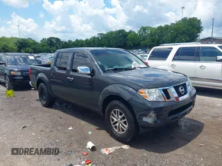 2014 Nissan Frontier SV with VIN 1N6AD0ER7EN706308, listed as a IAAI auction lot 42738891 with 153,589 mi miles and . Bid and sale history available at DreamBid. Image 1.
