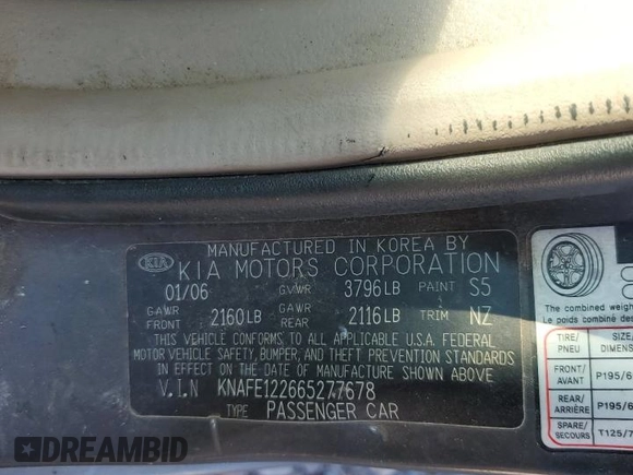 2006 Kia Spectra EX with VIN KNAFE122665277678, listed as a Copart auction lot 74695984 with 205,742 mi miles and Salvage Title. Bid and sale history available at carsss.com. Image 12.