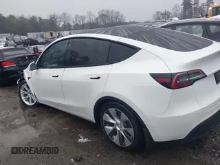 2021 Tesla Model Y Long Range with VIN 5YJYGDEEXMF228914, listed as a IAAI auction lot 41409806 with 48,276 mi miles. Bid and sale history available at carsss.com. Image 14.