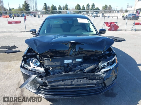 2015 Volkswagen Jetta Sedan 1.8T SE w/Connectivity with VIN 3VWD07AJ6FM354397, listed as a IAAI auction lot 41772983 with 100,265 mi miles. Bid and sale history available at carsss.com. Image 12.