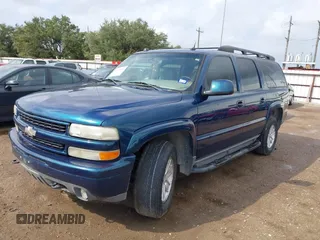 2005 Chevrolet Suburban Z71 with VIN 3GNFK16Z05G242037, listed as a IAAI auction lot 40719140 with 164,409 mi miles. Bid and sale history available at carsss.com. Image 2.
