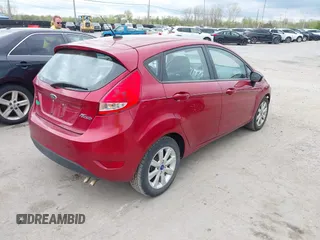 2013 Ford Fiesta SE with VIN 3FADP4EJXDM152463, listed as a IAAI auction lot 42122969 with 66,952 mi miles and . Bid and sale history available at DreamBid. Image 4.