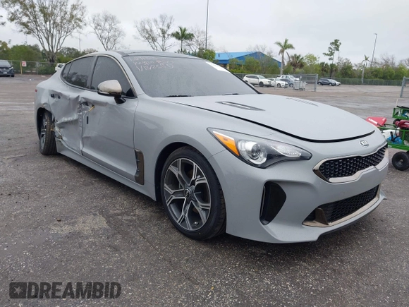 2021 Kia Stinger GT-Line with VIN KNAE15LA6M6091313, listed as a IAAI auction lot 41409011 with 34,356 mi miles. Bid and sale history available at carsss.com. Image 1.