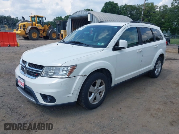 2012 Dodge Journey SXT with VIN 3C4PDDBG3CT307500, listed as a IAAI auction lot 42728446 with 122,072 mi miles and . Bid and sale history available at DreamBid. Image 2.