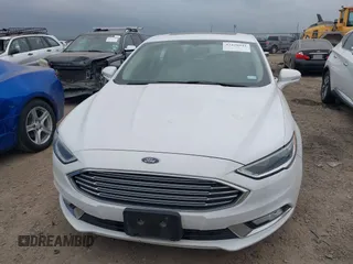 2017 Ford Fusion Titanium z VIN 3FA6P0K96HR124146, wystawiony jako IAAI lot #42428041 z przebiegiem 204 306 mil mil oraz . Historia ofert i sprzedaży dostępna na DreamBid. Obrazek 6.