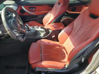 2014 BMW 4 Series 428i with VIN WBA3V7C55EP770804, listed as a Copart auction lot 79122804 with 98,890 mi miles and Salvage Title. Bid and sale history available at DreamBid. Image 7.