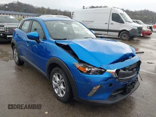 2016 Mazda CX-3 Touring with VIN JM1DKBC77G0112529, listed as a IAAI auction lot 41852258 with 134,412 mi miles and . Bid and sale history available at DreamBid. Image 1.