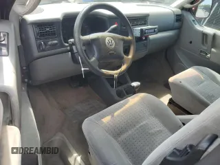 1999 Volkswagen EuroVan с VIN WV2MH2703XH045037, выставлен на аукционе Copart как лот 57109265 с пробегом 265 855 миль миль и Списание • Salvage title. История ставок и продаж доступна на DreamBid. Изображение 8.
