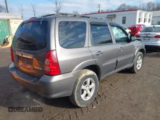 2006 Mazda Tribute LX with VIN 4F2YZ94126KM19822, listed as a IAAI auction lot 41534784 with 193,467 mi miles and . Bid and sale history available at DreamBid. Image 4.