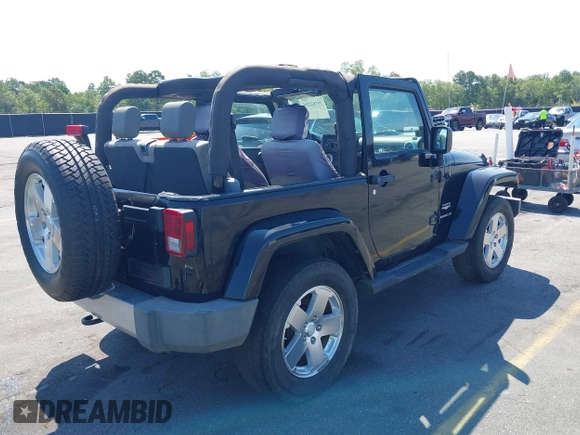2008 Jeep Wrangler Sahara with VIN 1J4FA54188L541664, listed as a IAAI auction lot 39784204 with 145,145 mi miles and . Bid and sale history available at DreamBid. Image 4.
