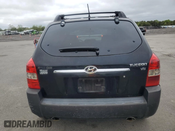 2005 Hyundai Tucson GLS with VIN KM8JN12D35U169629, listed as a Copart auction lot 57719265 with 97,467 mi miles and Clean title. Bid and sale history available at DreamBid. Image 6.
