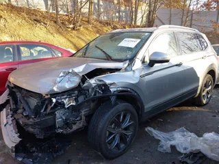 2023 Volkswagen Tiguan SE with VIN 3VVMB7AX7PM017807, listed as a IAAI auction lot 41422055 with 23,974 mi miles and . Bid and sale history available at DreamBid. Image 2.