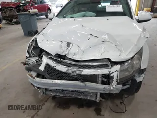 2014 Chevrolet Cruze 1LT with VIN 1G1PC5SB2E7182213, listed as a IAAI auction lot 40787686 with 129,882 mi miles and . Bid and sale history available at DreamBid. Image 6.