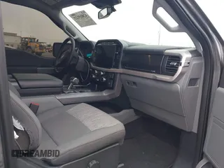 2023 Ford F-150 Lightning Pro with VIN 1FTVW1EL8PWG48559, listed as a IAAI auction lot 42033123 with 8,845 mi miles and . Bid and sale history available at DreamBid. Image 5.