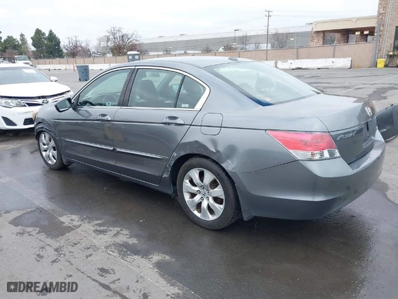 2008 Honda Accord Sdn EX-L with VIN JHMCP26848C047459, listed as a IAAI auction lot 41471496 with 140,702 mi miles. Bid and sale history available at carsss.com. Image 3.