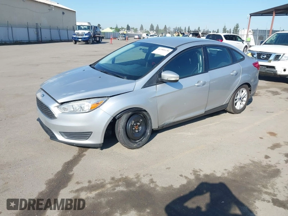 2016 Ford Focus SE with VIN 1FADP3F24GL230601, listed as a IAAI auction lot 41988130 with 176,366 mi miles. Bid and sale history available at carsss.com. Image 2.