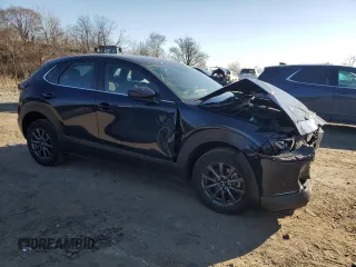 2023 Mazda CX-30 S with VIN 3MVDMBAMXPM553151, listed as a Copart auction lot 47517205 with 23,629 mi miles and Salvage Title. Bid and sale history available at carsss.com. Image 4.