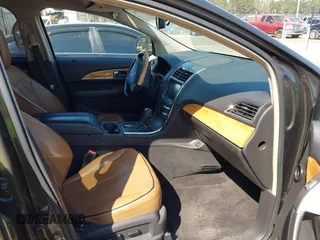 2011 Lincoln MKX with VIN 2LMDJ6JK1BBJ11840, listed as a IAAI auction lot 41769107 with 202,313 mi miles. Bid and sale history available at carsss.com. Image 5.