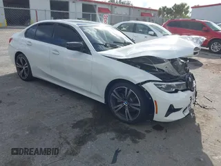 2019 BMW 3 Series 330i z VIN 3MW5R1J57K8A03673, wystawiony jako IAAI lot #41672322 z przebiegiem 72 083 mil mil oraz . Historia ofert i sprzedaży dostępna na DreamBid. Obrazek 1.