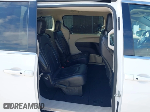 2022 Chrysler Pacifica Touring L with VIN 2C4RC1BG8NR197706, listed as a IAAI auction lot 42414290 with 56,972 mi miles and . Bid and sale history available at DreamBid. Image 8.
