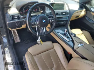 2015 BMW M6 z VIN WBSLX9C58FD160609, wystawiony jako Copart lot #56992535 z przebiegiem 52 324 mil mil oraz Tytuł czysty. Historia ofert i sprzedaży dostępna na DreamBid. Obrazek 8.