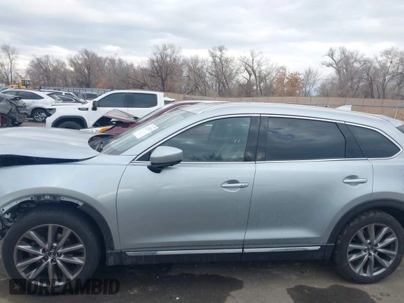 2021 Mazda CX-9 Grand Touring with VIN JM3TCBDY8M0515065, listed as a IAAI auction lot 41359765 with 80,221 mi miles and . Bid and sale history available at carsss.com. Image 15.