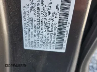 2023 Honda Odyssey Touring with VIN 5FNRL6H89PB034171, listed as a Copart auction lot 55039095 with Not Provided miles and Salvage Title. Bid and sale history available at DreamBid. Image 14.