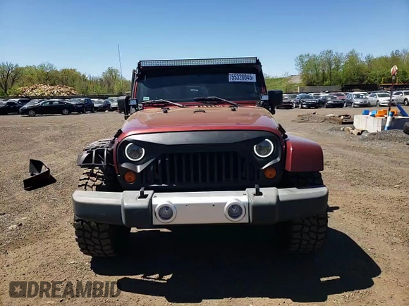 2008 Jeep Wrangler Sahara z VIN 1J4FA54198L505014, wystawiony jako Copart lot #55328045 z przebiegiem 128 049 mil mil oraz Szkoda całkowita • Salvage title. Historia ofert i sprzedaży dostępna na DreamBid. Obrazek 13.