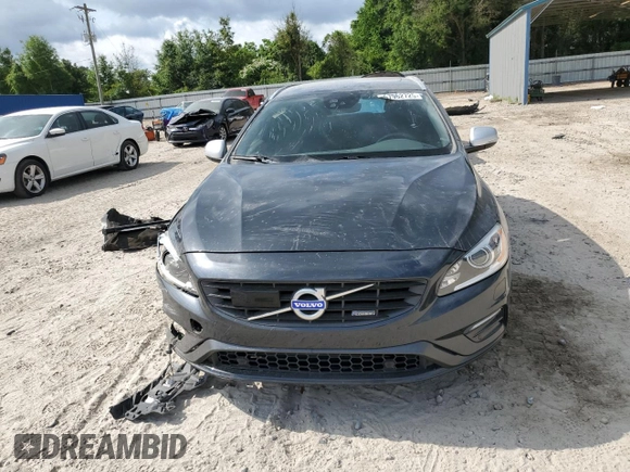 2015 Volvo V60 z VIN YV1902SS6F1227756, wystawiony jako Copart lot #57962725 z przebiegiem 62 542 mil mil oraz Szkoda całkowita • Salvage title. Historia ofert i sprzedaży dostępna na DreamBid. Obrazek 5.