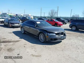 2012 Audi A7 3.0 Prestige with VIN WAU2GAFC7CN101018, listed as a IAAI auction lot 41753827 with 143,740 mi miles. Bid and sale history available at carsss.com. Image 1.