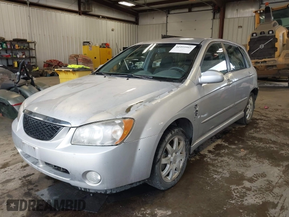 2006 Kia Spectra with VIN KNAFE161X65283615, listed as a IAAI auction lot 41955968 with 185,177 mi miles. Bid and sale history available at carsss.com. Image 2.