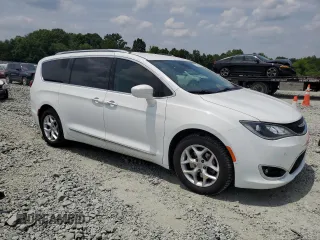 2017 Chrysler Pacifica Touring L Plus с VIN 2C4RC1EG2HR833620, выставлен на аукционе Copart как лот 57954605 с пробегом 106 025 миль миль и Списание • Salvage title. История ставок и продаж доступна на DreamBid. Изображение 4.