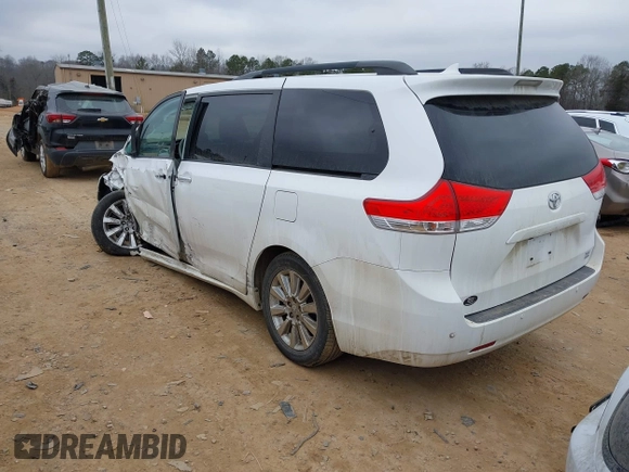 2011 Toyota Sienna XLE with VIN 5TDDK3DC0BS015244, listed as a IAAI auction lot 41413002 with 128,591 mi miles. Bid and sale history available at carsss.com. Image 3.
