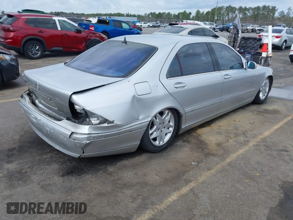 2003 Mercedes-Benz S-Class 4.3L with VIN WDBNG70J23A317424, listed as a IAAI auction lot 41716056 with 175,616 mi miles. Bid and sale history available at carsss.com. Image 4.