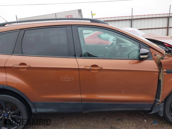 2017 Ford Escape Titanium with VIN 1FMCU9J99HUB75687, listed as a IAAI auction lot 41180789 with 108,967 mi miles. Bid and sale history available at carsss.com. Image 14.