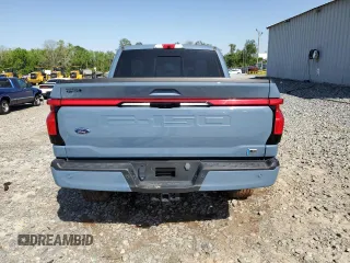 2023 Ford F-150 Lightning Pro с VIN 1FT6W1EV1PWG53186, выставлен на аукционе Copart как лот 52423485 с пробегом 23 518 миль миль и Списание • Salvage title. История ставок и продаж доступна на DreamBid. Изображение 6.